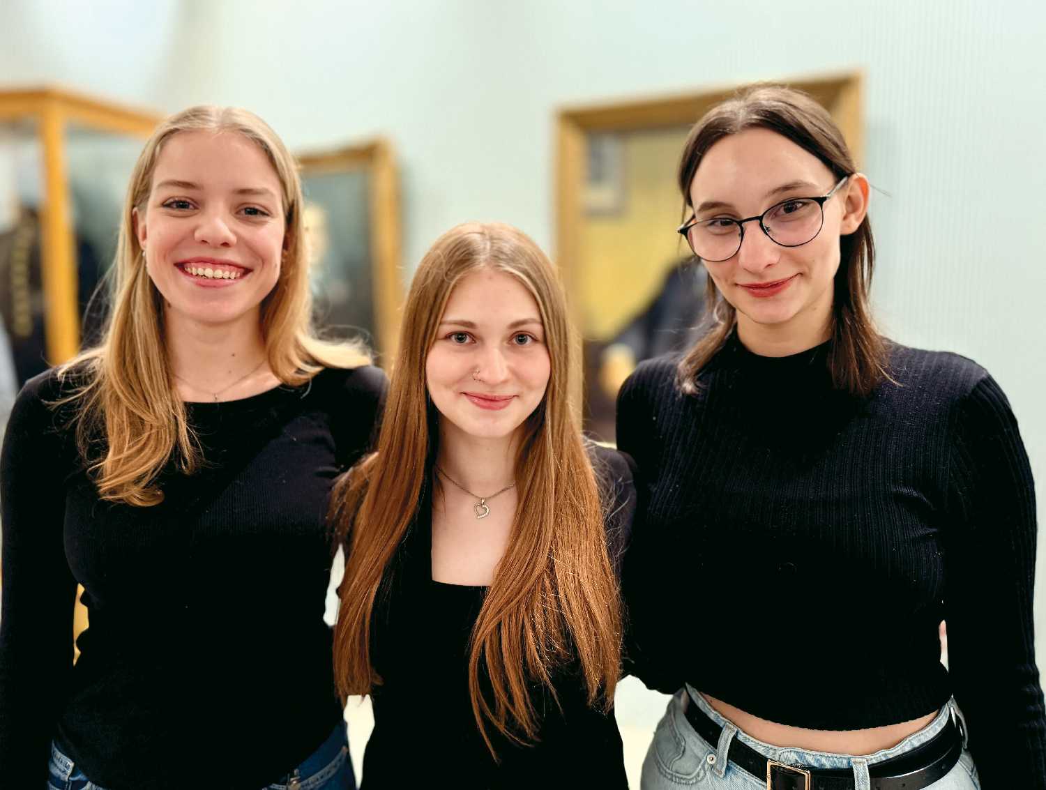 University students Olha, Diana and Valeriia at the announcement on Tuesday.